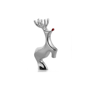 Three-quarter view of silver reindeer pendant showcasing a red enamel nose on white background