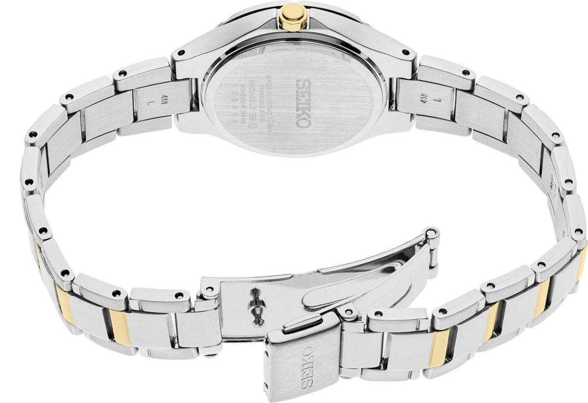 Back view of Seiko SUR414 Essentials Collection watch showcasing its two-tone stainless steel bracelet and caseback on a white background