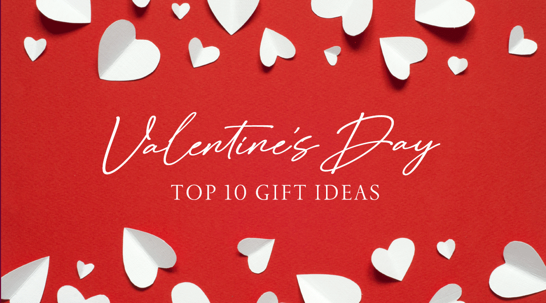 Promotional banner showing Valentine’s Day top 10 gift ideas with white paper hearts on a red background