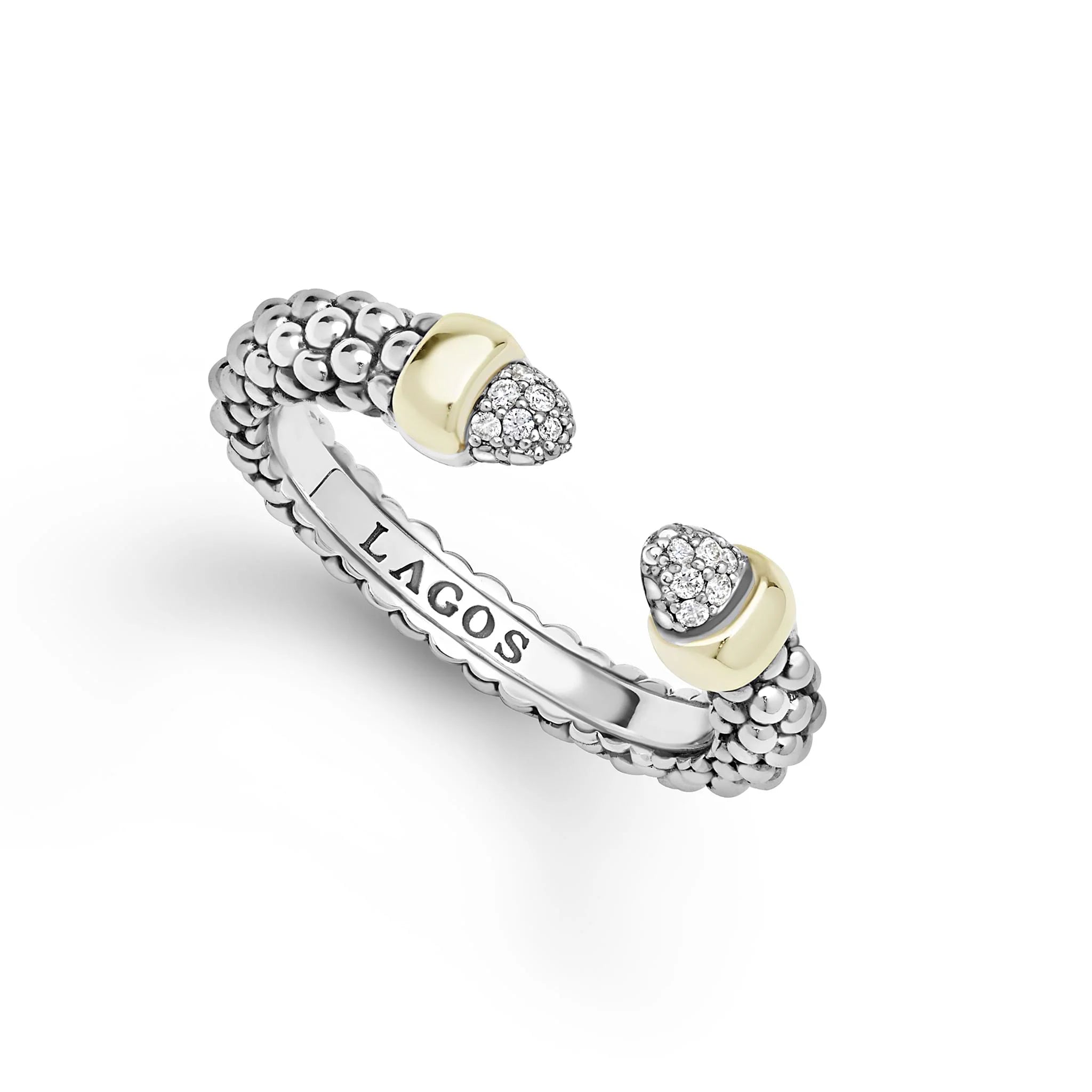 A silver-toned open cuff ring by Lagos, featuring textured beaded ends, pavé-set clear stones on both ends, and a polished yellow gold accent at each end. The inner band is engraved with the brand name 'LAGOS'.