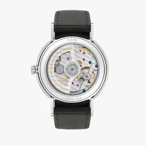 Watch with visible mechanical components on a white background