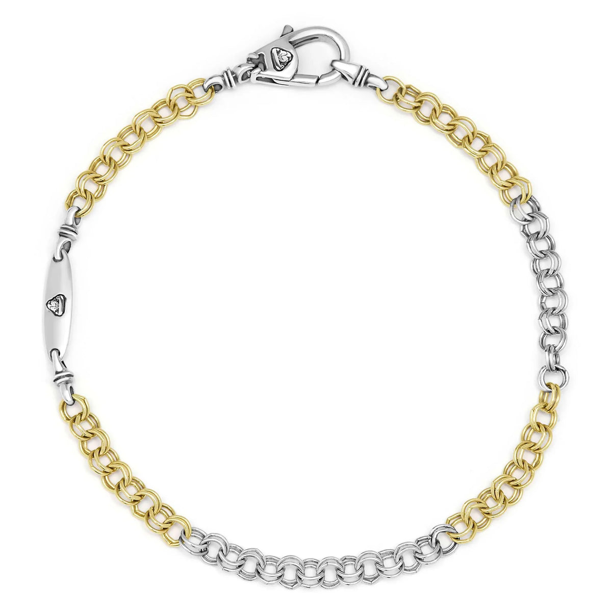 gold and silver tone link bracelet on a white background