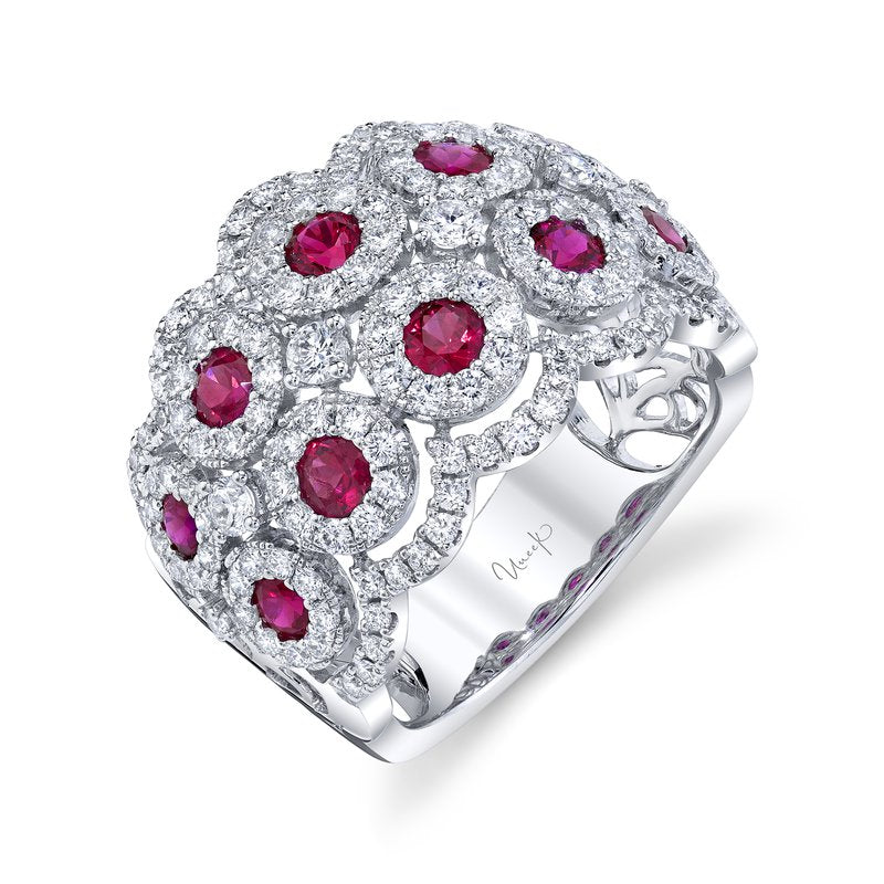 Angled view of Diamond and Ruby Fashion Ring with round rubies in diamond halos and pave diamonds on 18K white gold
