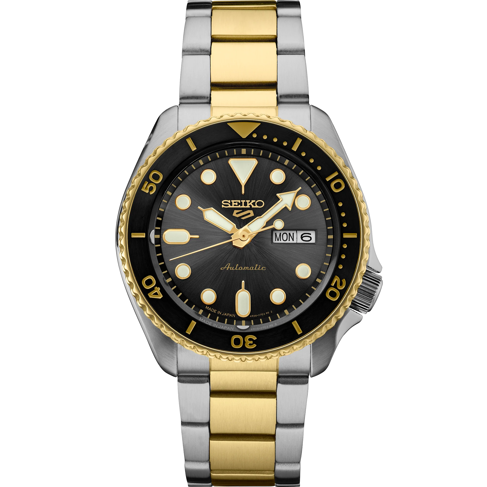 A Seiko automatic watch with a two-tone stainless steel and gold-tone link bracelet, featuring a black dial, black bezel, and gold-tone hour markers.