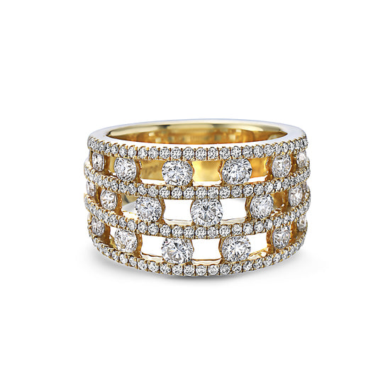 A yellow gold ring with multiple rows of pavé-set and round-cut diamonds, shown on a clean white background.