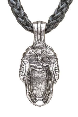 Front view of William Henry Cristobal Skull pendant in sterling silver on braided leather cord, white background