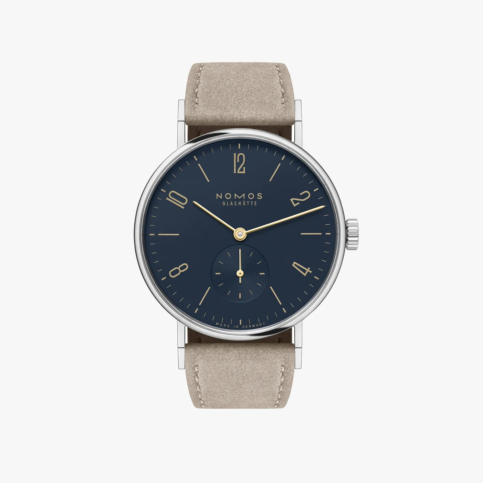 Stainless steel watch with dark blue dial, gold hands and beige strap on a white background