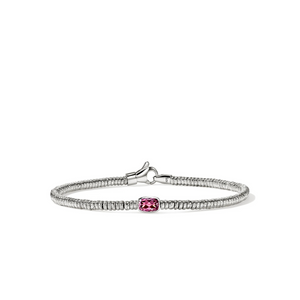 A silver beaded bracelet featuring a central cushion-cut pink gemstone, displayed on a clean white background.