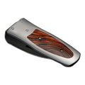 Angled view of William Henry Coco money clip showcasing cocobolo wood inlay and titanium frame on white background