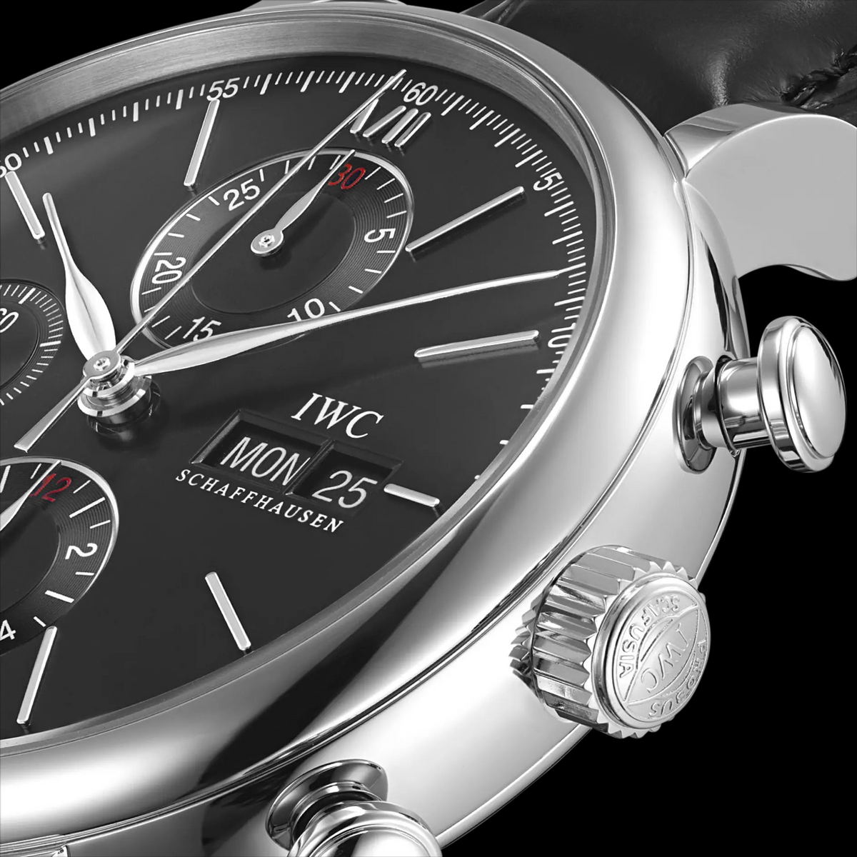 close up of IWC Schaffhausen black dial on a black background