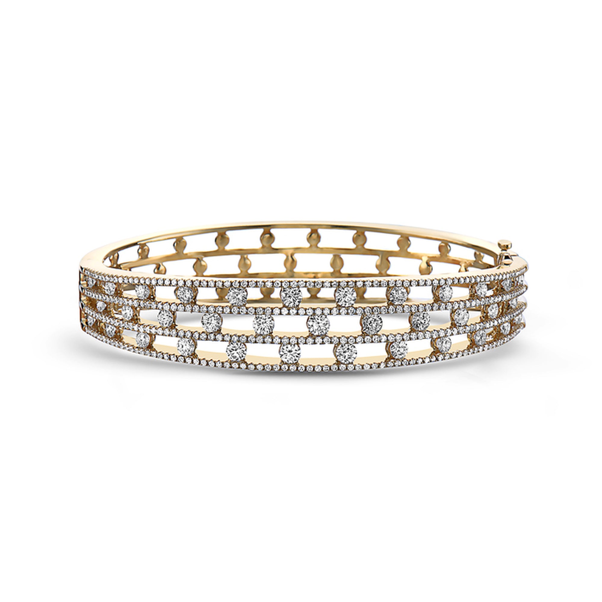 Gold bracelet with diamond accents on a white background