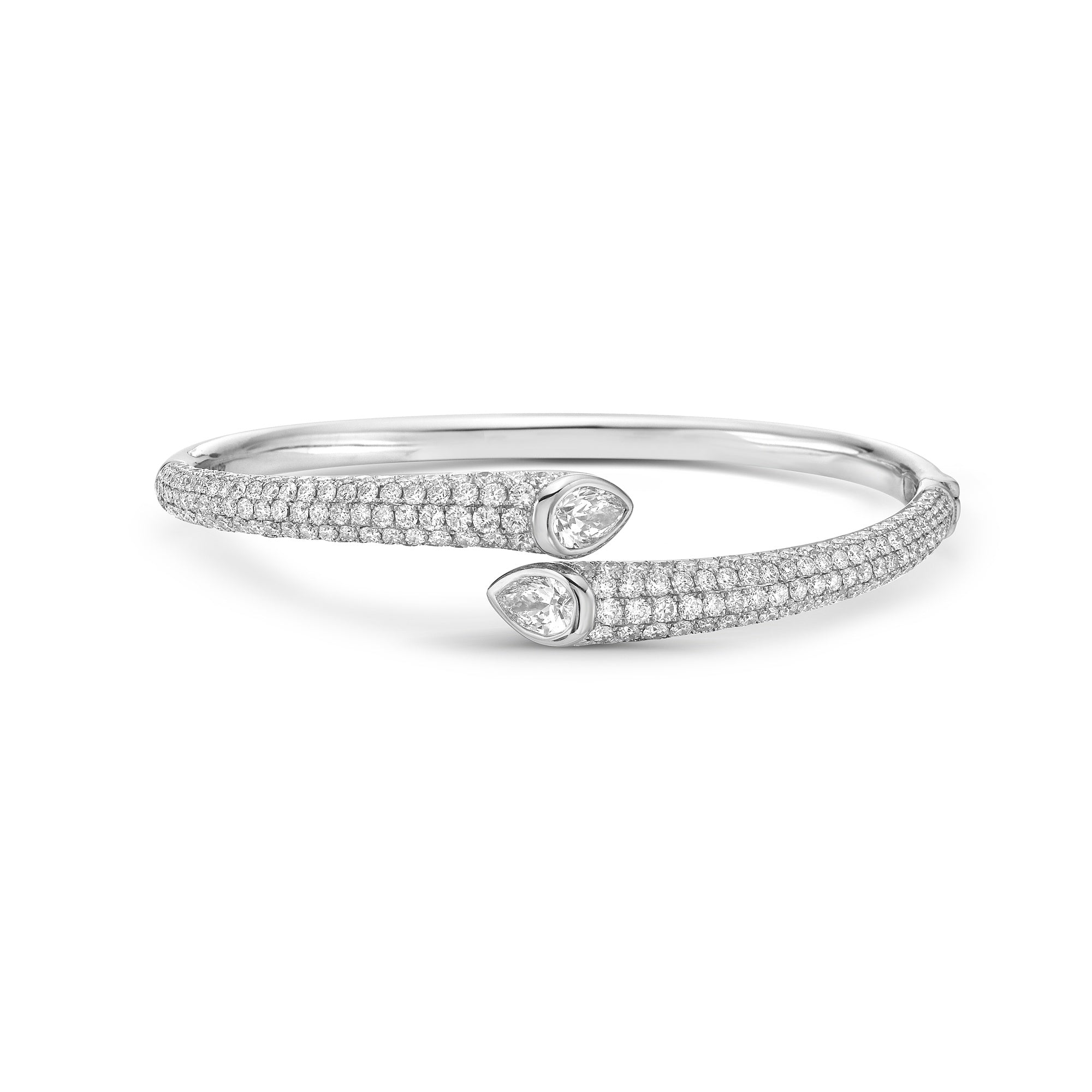Diamond pave cuff with 2 pear shaped diamonds on each end on a white background