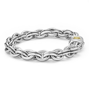 Close-up of double link bracelet showing polished sterling silver links and krunch crescent clasp with 18K gold detail