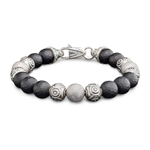 William Henry Monomyth bracelet with black faceted beads and silver carved spacer beads and metal clasp