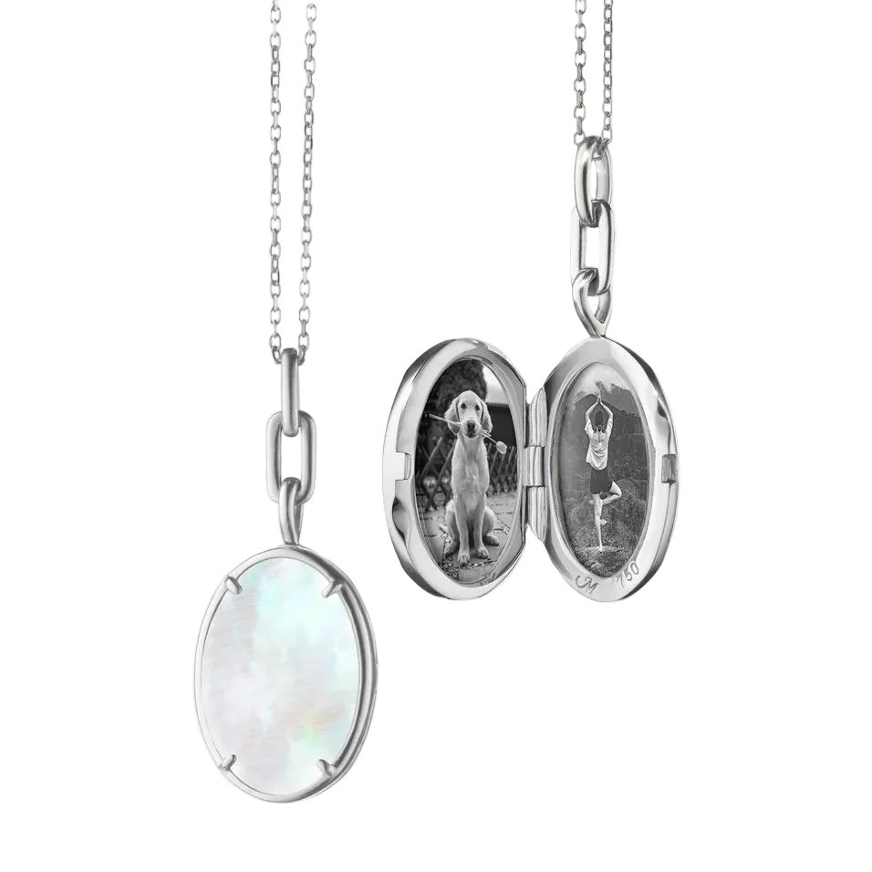 silver locket necklace with white mother pearl that is able to hold two images