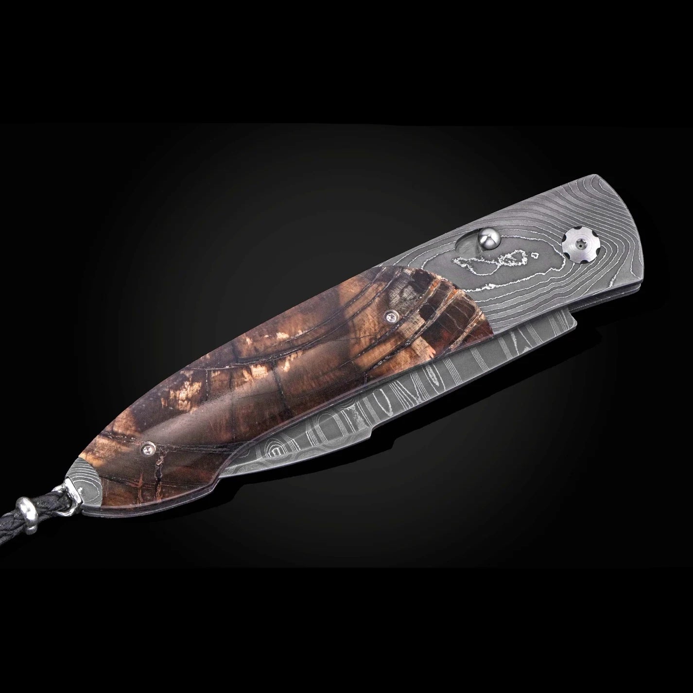 A Damascus steel folding pocket knife with a patterned brown wood-grain handle, shown diagonally on a dark background.
