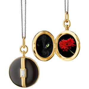 Black Enamel Round Locket with White Sapphire necklace with black steel chain that holds two images on a white background