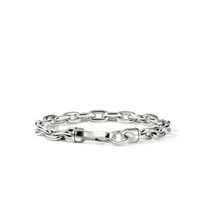 A polished silver-tone chain link bracelet with a central decorative bar clasp, displayed on a clean white background.