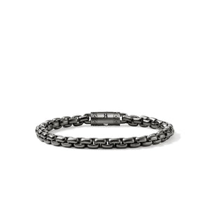 Dark sterling silver box chain bracelet on a white background
