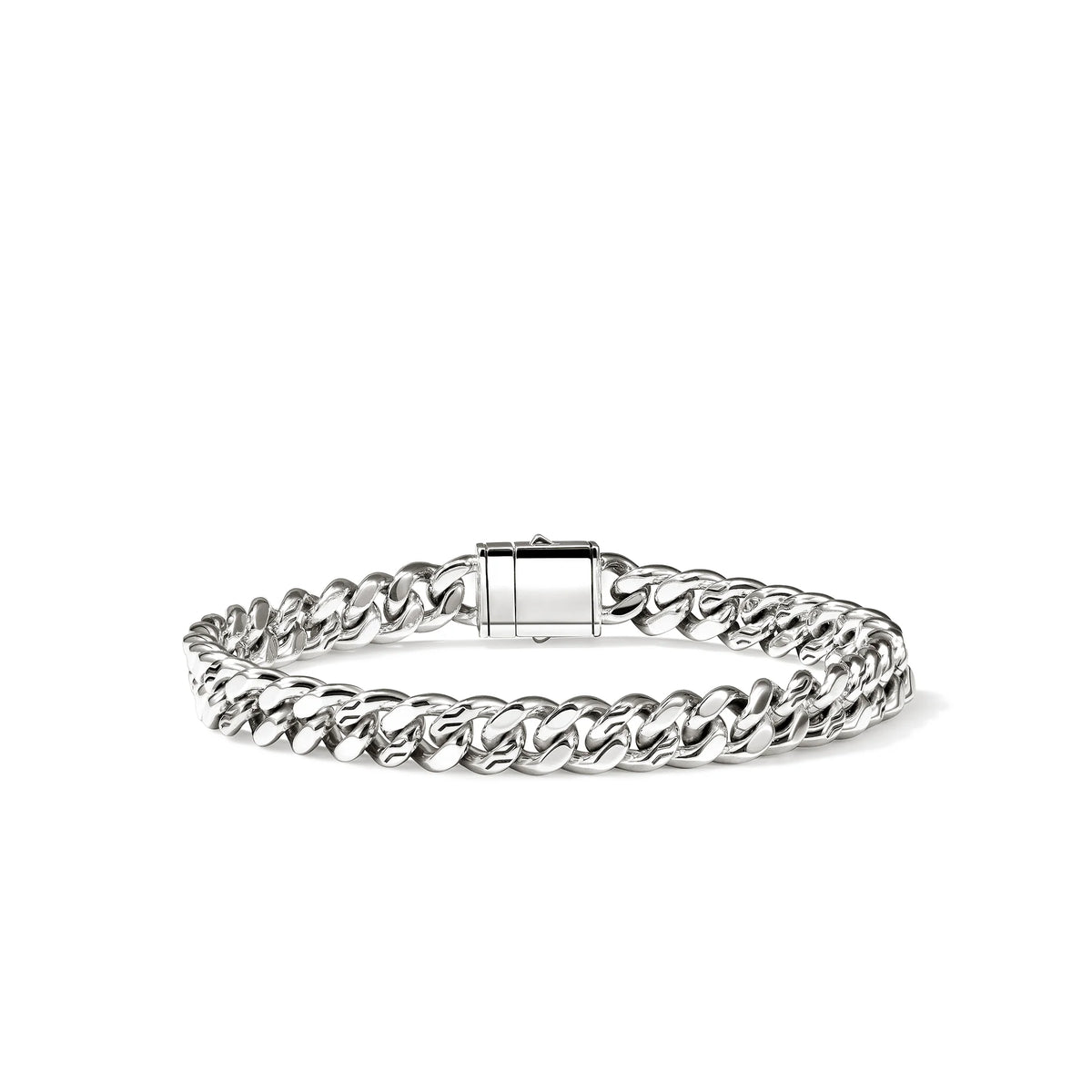 Sterling silver curb chain bracelet on a white background