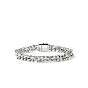 Sterling silver curb chain bracelet on a white background