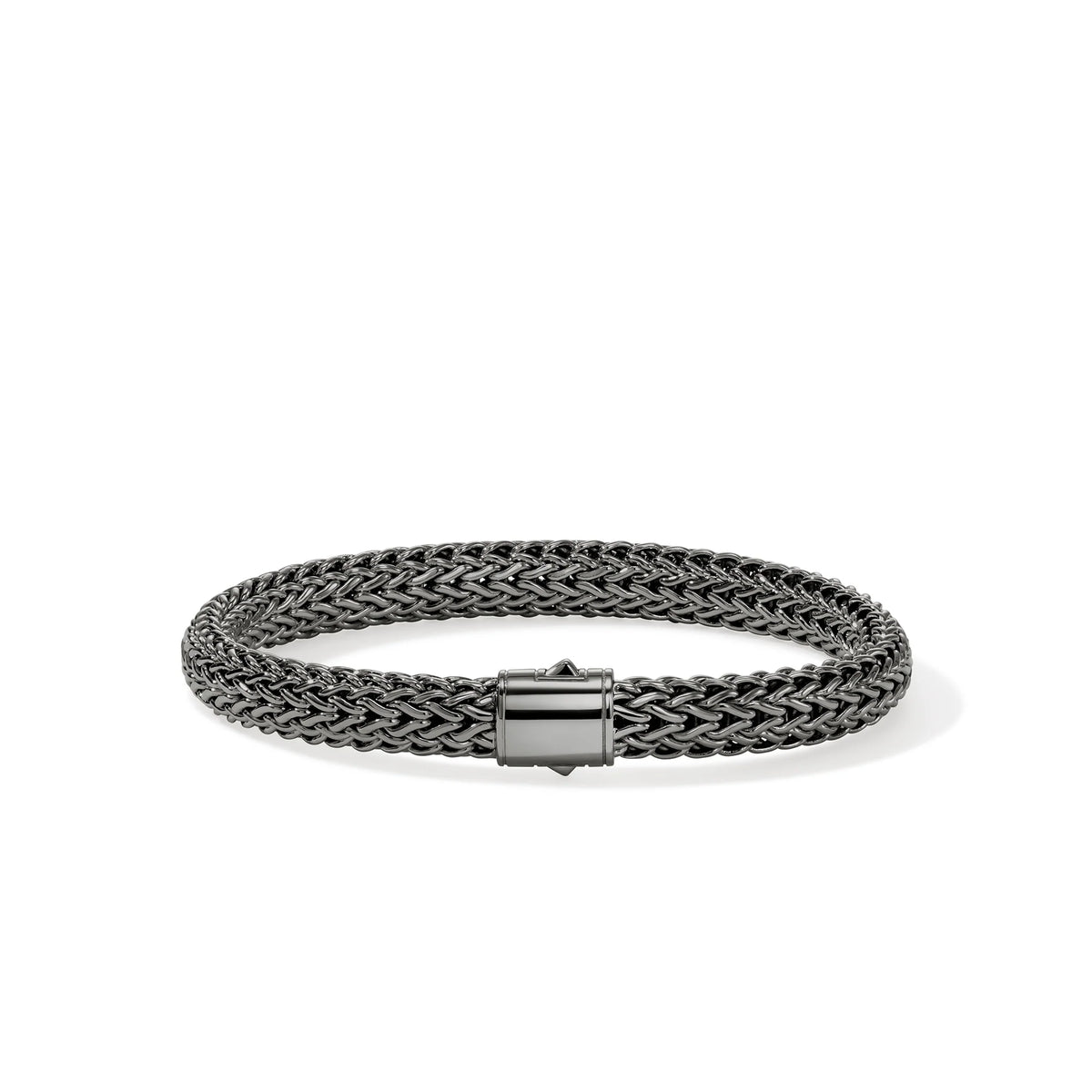 Dark sterling silver bracelet on a white background