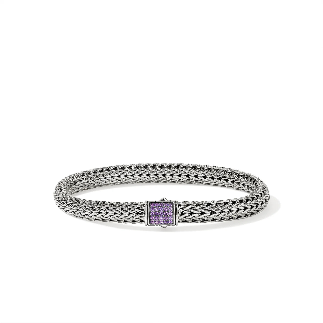 Silver bracelet with amethyst gemstones on a white background