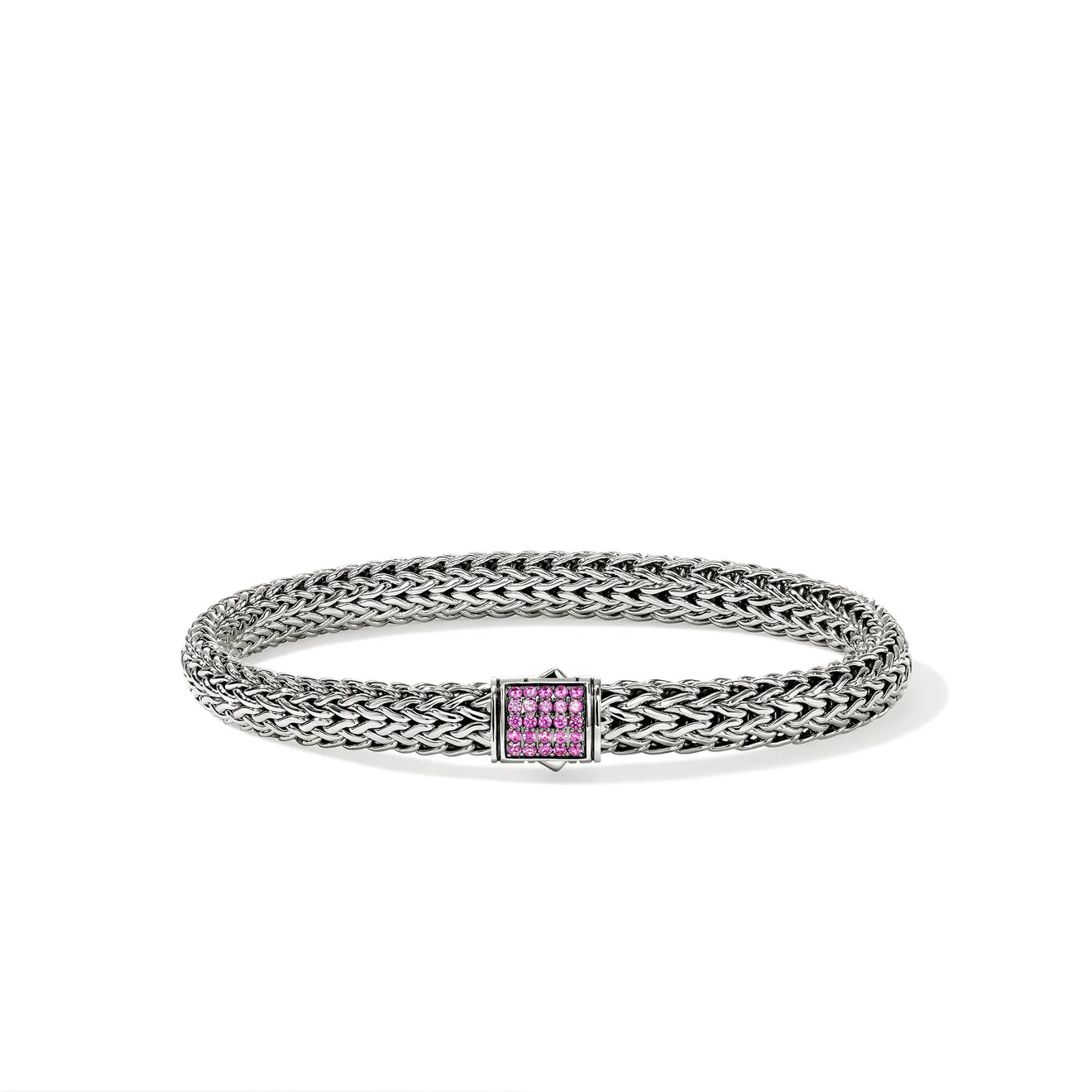 Silver bracelet with a pink sapphires on a white background
