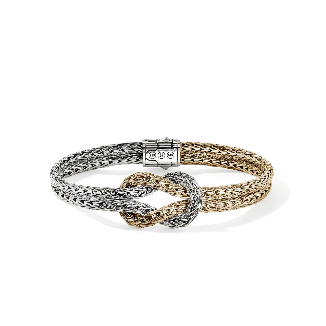 Two braided bracelets, one silver and one gold, on a white background.
