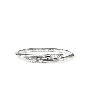 Silver bracelet with intricate design on a white background