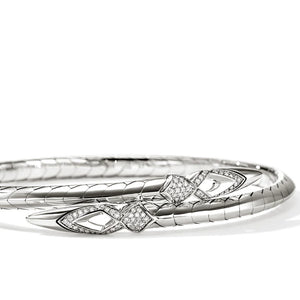 Silver bracelet with diamond accents on a white background