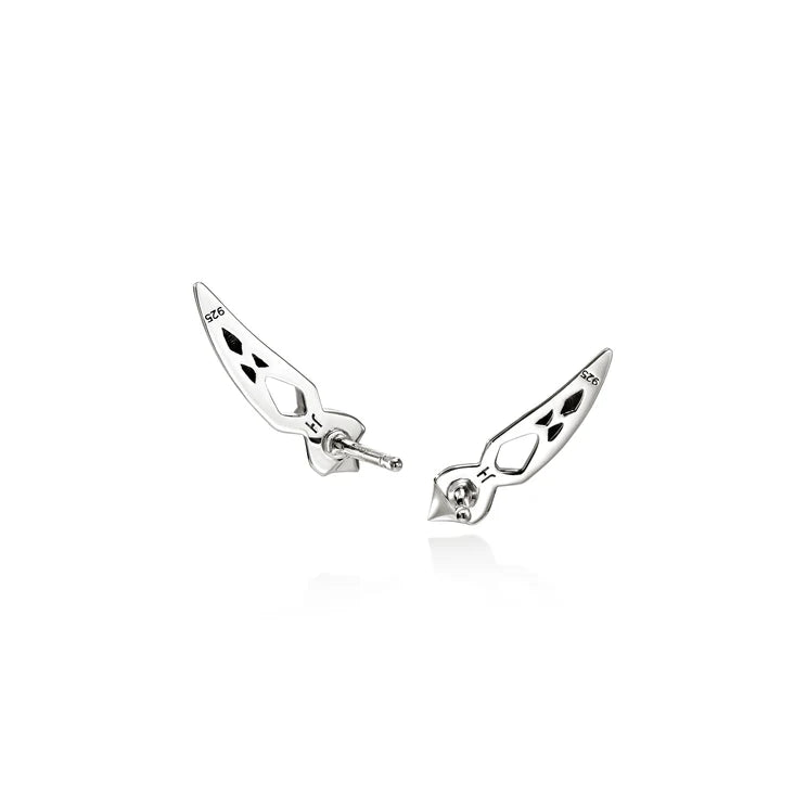 A pair of silver stud earrings with black engraved details, displayed on a clean white background.