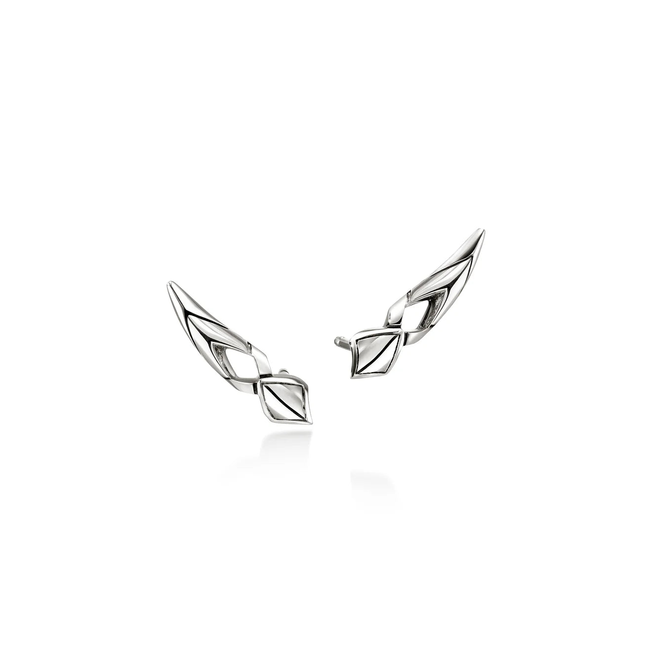 A pair of silver-toned geometric stud earrings with a polished, angular design, displayed on a clean white background with a soft reflection.