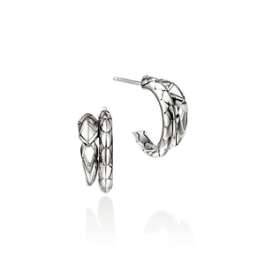 Pair of silver hoop earrings on a white background