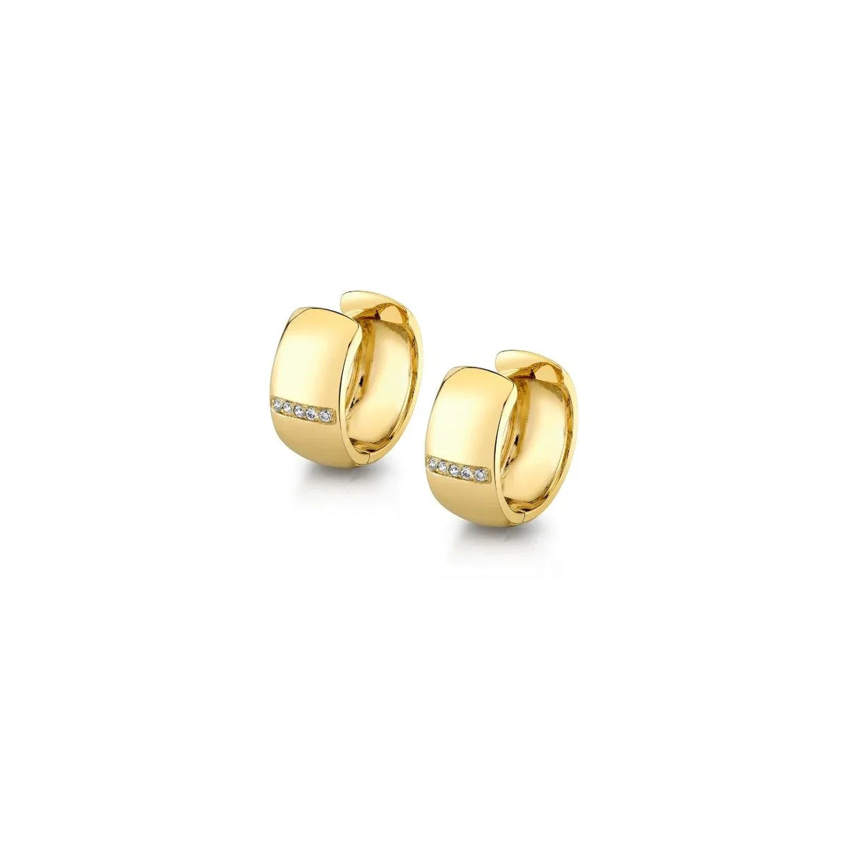 gold wide huggie hoop earrings on a white background
