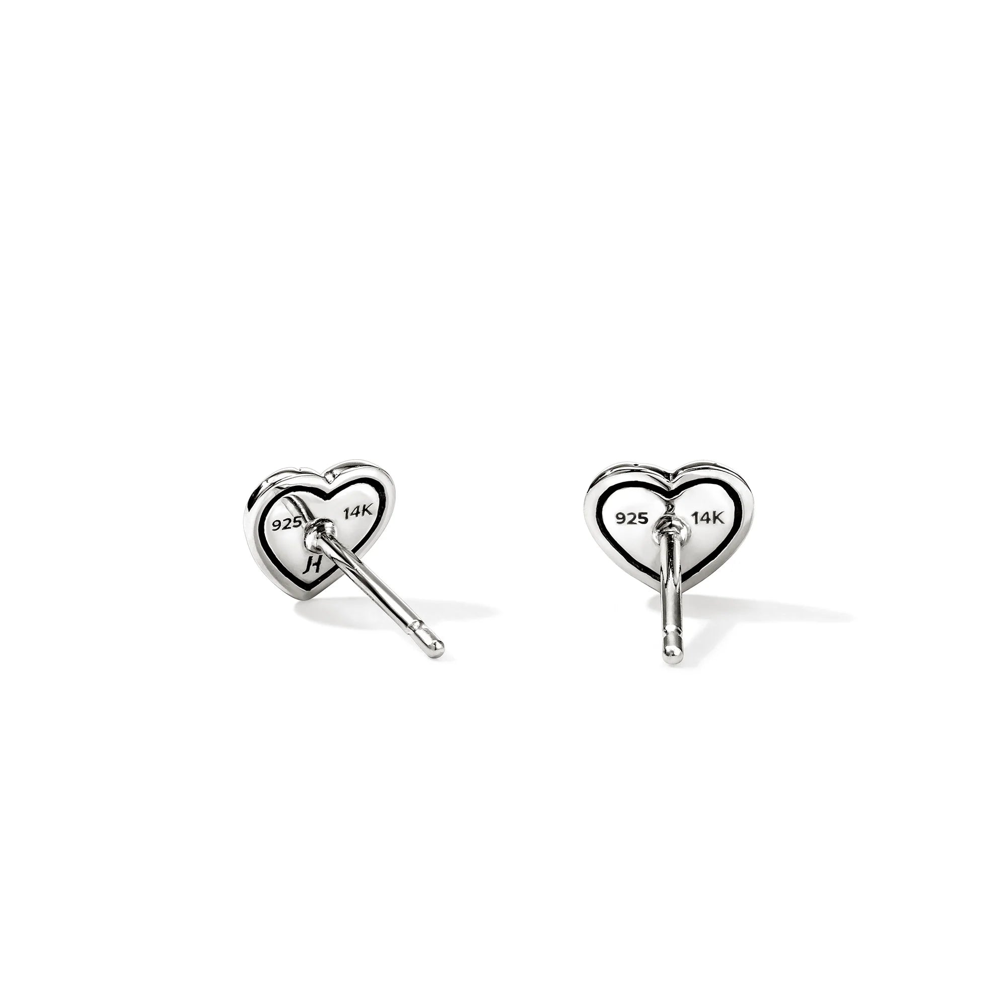 Silver heart-shaped earrings on a white background