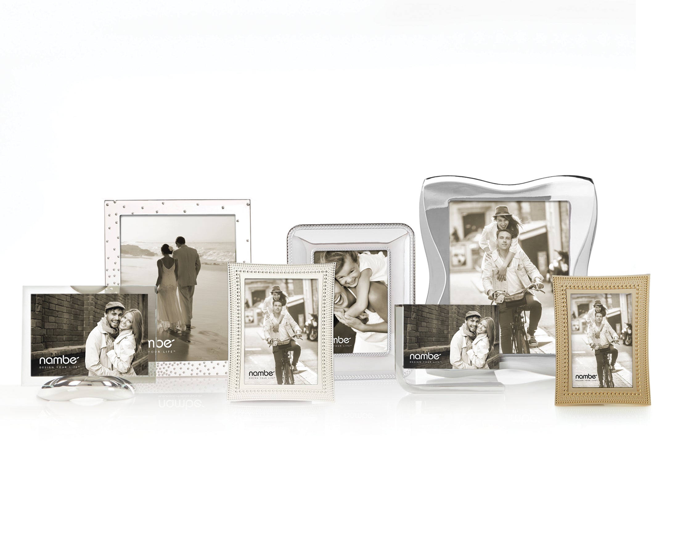 Set of metal photo frames in assorted shapes and sizes with sepia sample photos; 'nambe' logo visible on inserts.