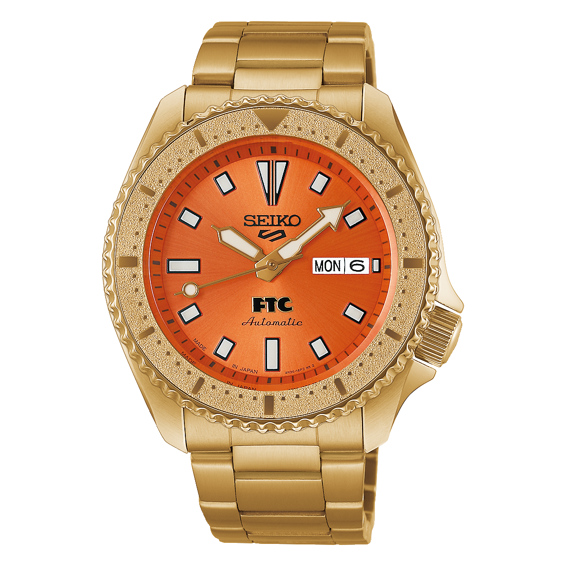 Goldtone Seiko watch with orange dial on a white background