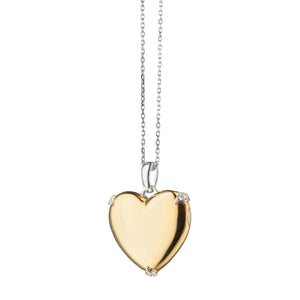 two-tone "Heart of Gold" locket necklace features diamond accents
