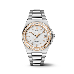 IWC watch with stainless steel, gold and diamond accents on a white background