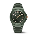 Green ceramic IWC watch with rose gold accents on a white background