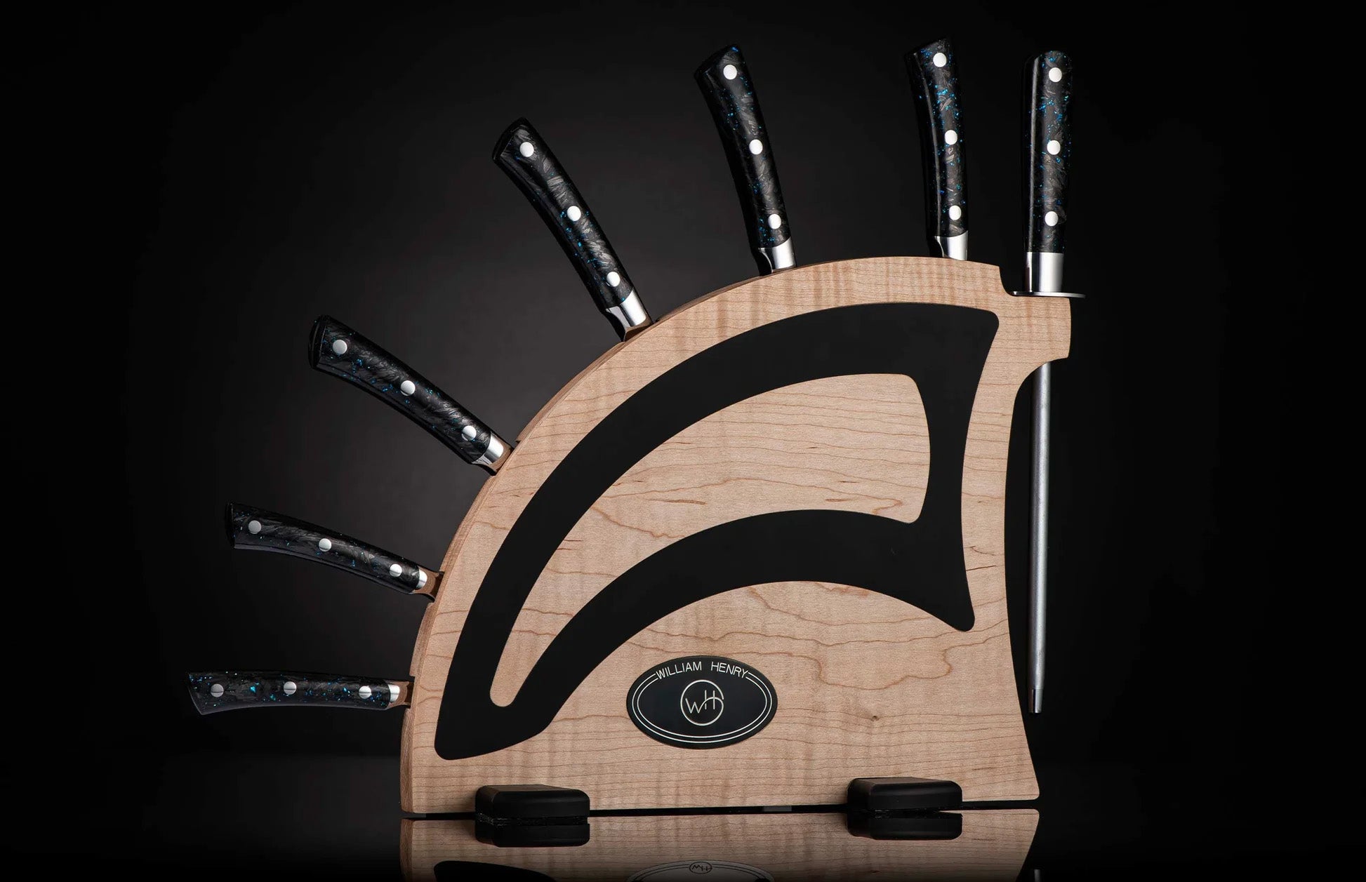 Front view of Kultro Pro chef knife set in maple display showing six black-handled knives fanned against dark background