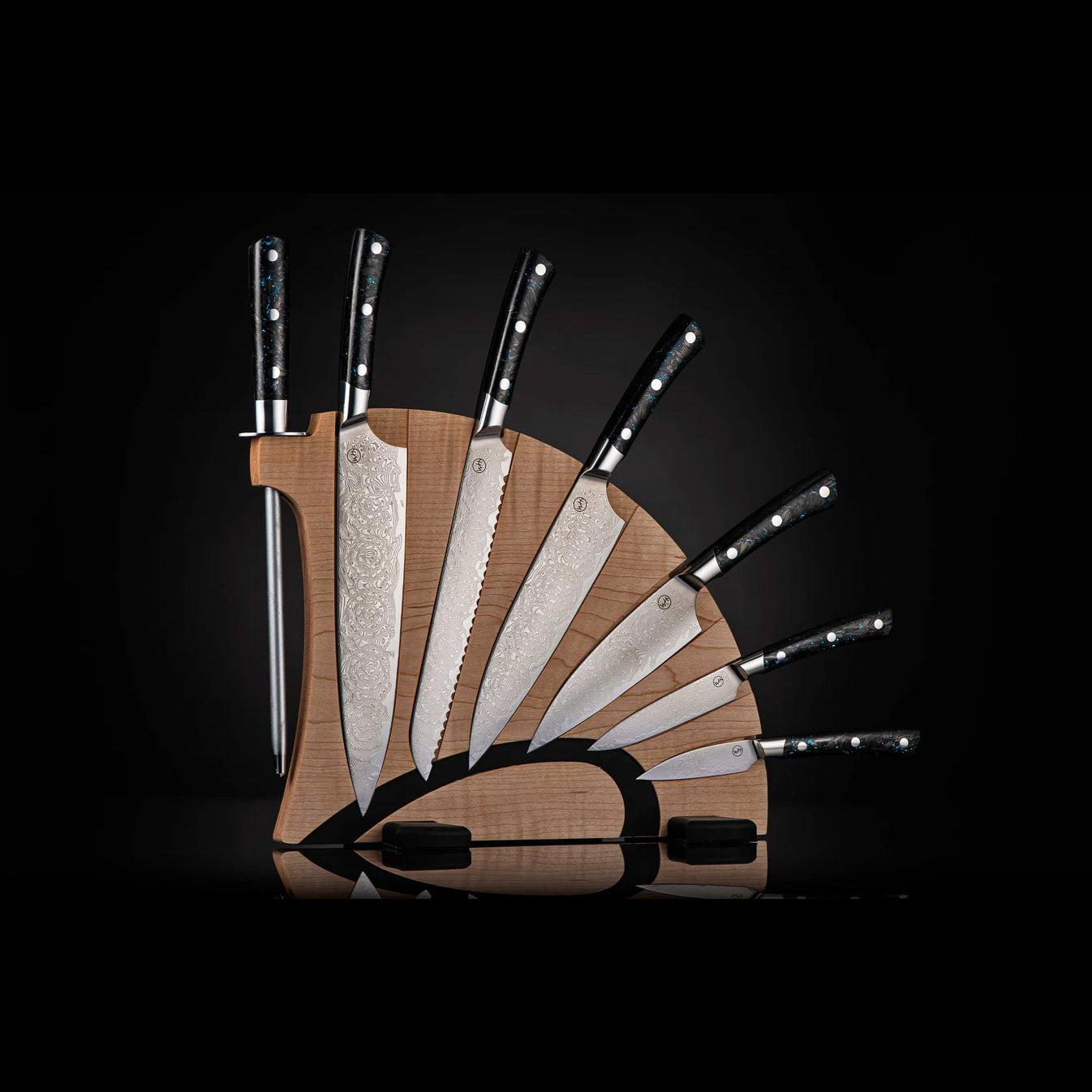 Front view of Kultro Pro chef knife set on maple display showing six stainless-steel blades with patterned finish and black handles