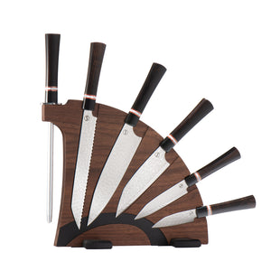 Front view of Kultro Gourmet Ebony knife set on fan-shaped walnut block, hammered Damascus blades and dark wood handles on white