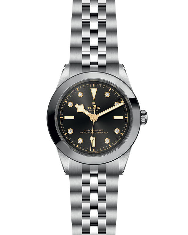 Front of TUDOR Black Bay 39mm steel watch showcasing anthracite dial with gold hands and diamond markers on steel bracelet