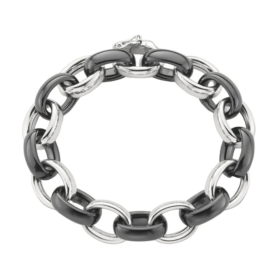 silver and black ceramic link bracelet on a white background