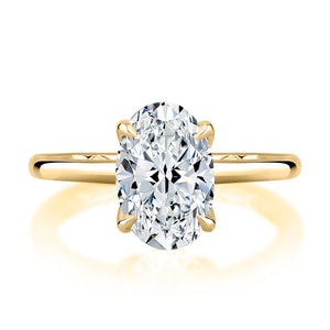 0.10ctw Oval Solitaire Diamond Engagement Ring