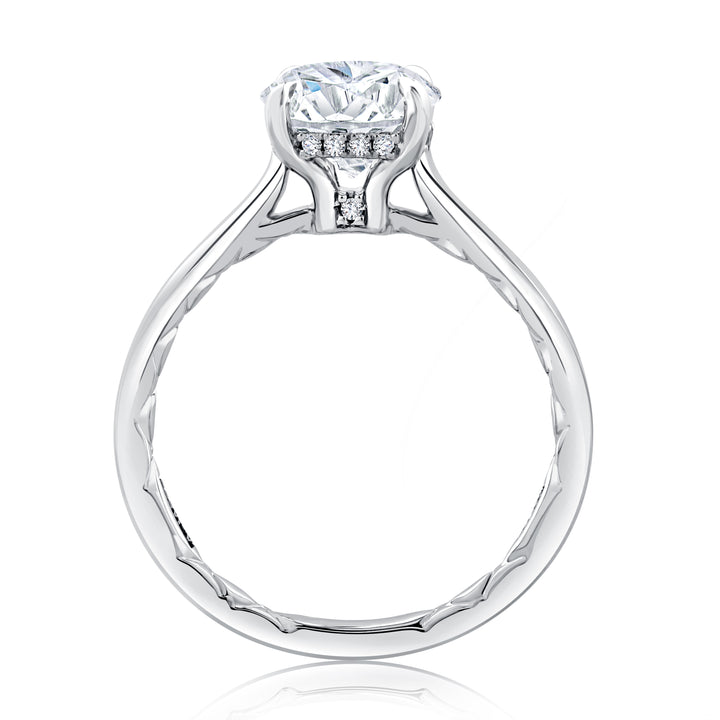 Classic Four Prong Round Cut Solitaire Diamond Engagement Ring with Peekaboo Diamond
