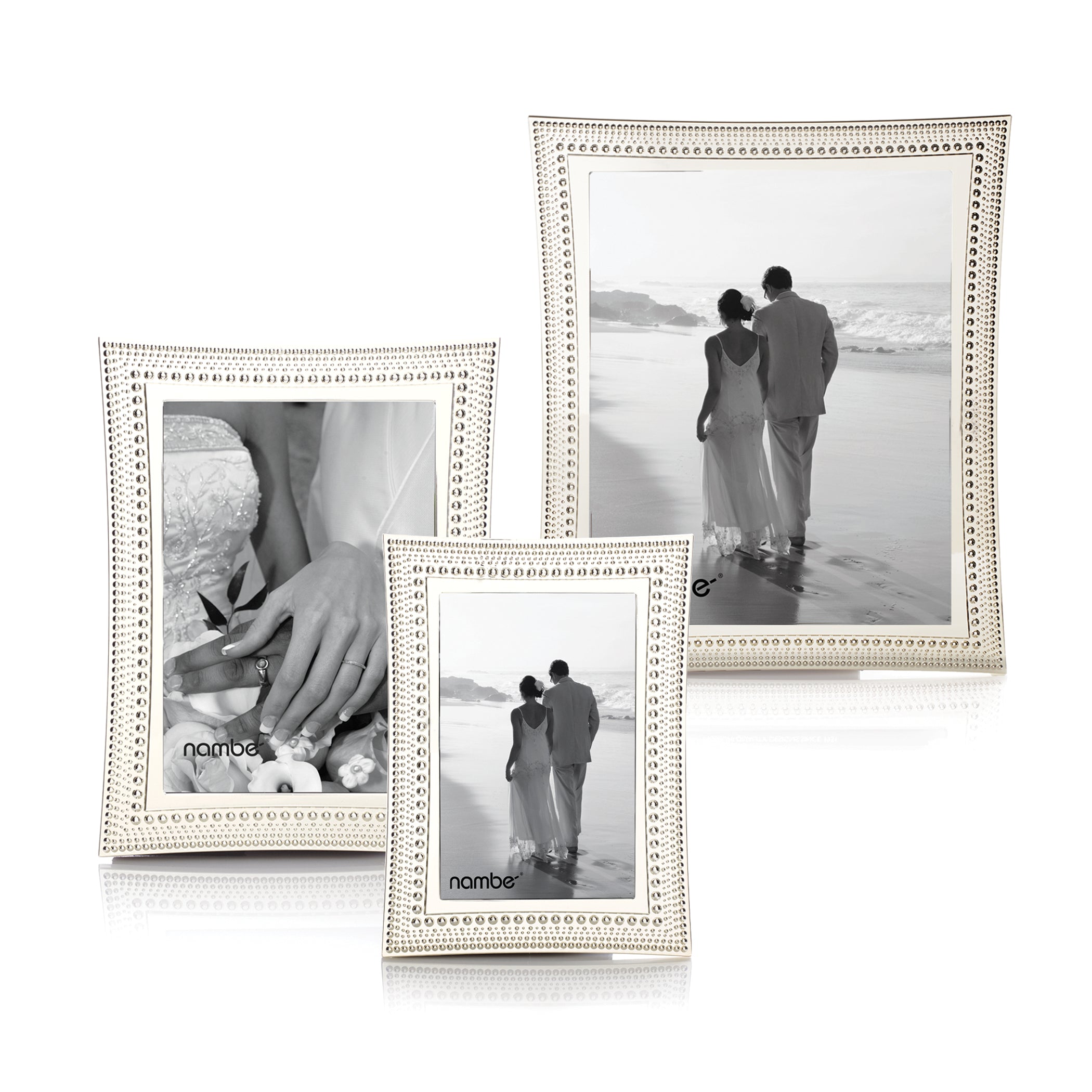 Set of three silver-tone beaded picture frames with wedding photos; 'nambe' logo visible