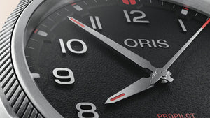 Oris watch face with black dial and silver accents